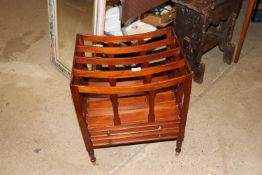 A mahogany four section Canterbury fitted two draw