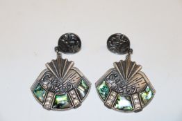A pair of abalone shell and pewter ear-rings