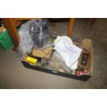 A box containing old glass bottles, cash tin, adve