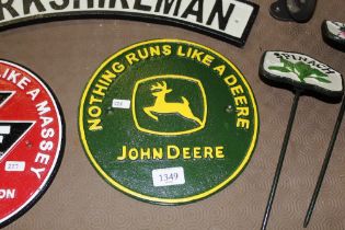A reproduction cast iron plaque for John Deere (22