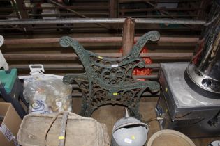 A pair of cast iron bench ends