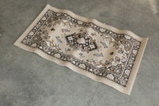 An approx. 3'7" x 2' floral patterned runner