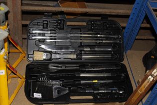 An as new barbeque utensil set