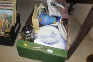 A box containing kitchen china; decorative plates;