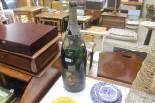 An empty Lanson champagne bottle