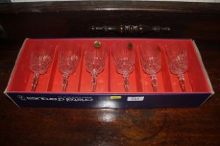 A boxed set of six wine glasses