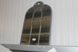 A metal framed wall mirror (147)