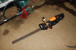 A Vonhaus cordless electric hedge trimmer lacking