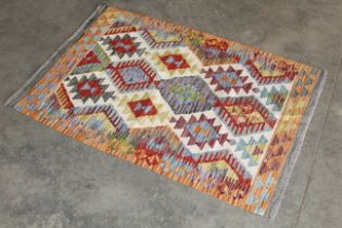 An approx. 4'2" x 2'8" Chobi Kilim rug