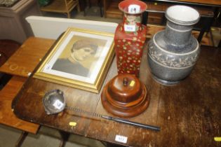 A silver plated ebony handled punch ladle; framed