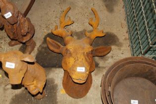 A large cast iron stags head (129)