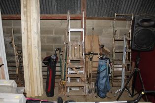 An aluminium step ladder together with a wooden s