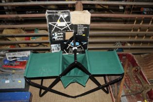 A double folding chair with original box