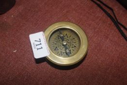 A reproduction brass combined compass and magnifying glass (90)