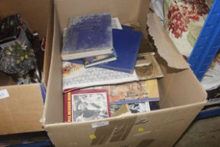 A box of Royal Commemorative books and others
