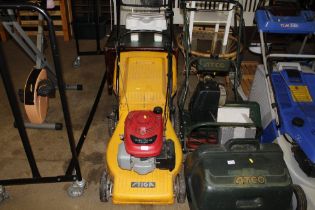 A Stiga Turbo Pro 48 combi petrol lawn mower