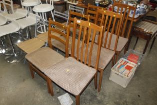 Three slat back dining chairs and three bar back d