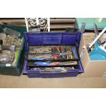 A plastic toolbox and contents of various fittings