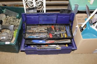 A plastic toolbox and contents of various fittings