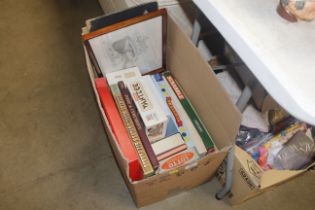 A box of board games; records; pictures etc.