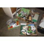 Four boxes of Playmobil and other toys including a
