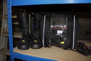 A pair of motorcycle boots size 10.5 together with