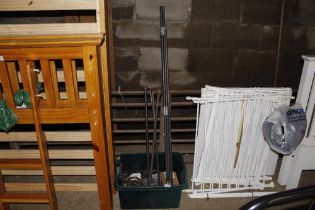 A box containing stakes and various other fittings