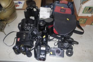 A collection of various cameras, accessories and b