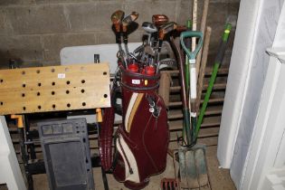 A golf bag and contents of mainly Wilson clubs