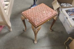 A dressing table stool raised on Gabrielle support