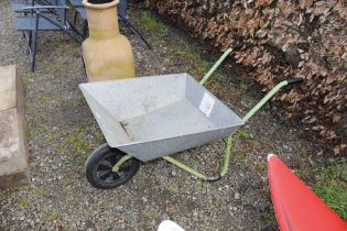 A galvanised wheelbarrow