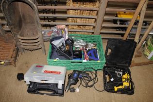 A plastic crate and contents of various tools, a D