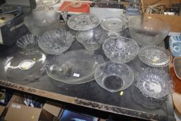 A collection of table glassware to include cakes s
