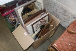 A box containing wall mirror; various pictures and