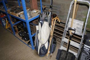 A golf bag and contents together with various walk