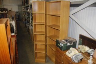 Two wood effect open fronted bookcases