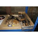 A box of assorted wood chisels together with a box