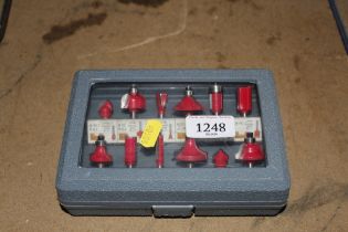 A cased set of router bits