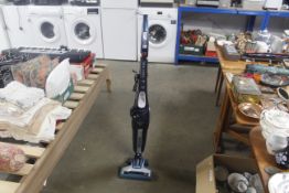 A Hoover upright vacuum cleaner