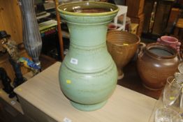 A large green glazed West German pottery style vas