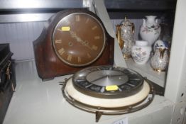 A Metamec retro wall clock and an oak cased two hole mantel clock