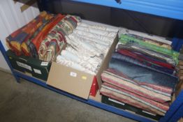 Three boxes of assorted fabrics