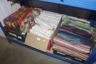 Three boxes of assorted fabrics