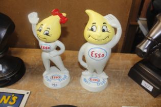 Two reproduction cast metal Esso advertising money