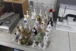 A collection of glass and china handbells