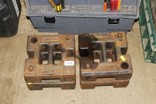 Four cast iron Doughty stage weights