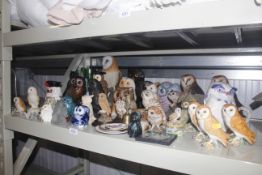 A large quantity of various owl ornaments to inclu
