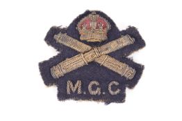 A WWI era Machine Gun Corps cloth badge