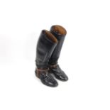 A pair of black Officers boots complete with spurs