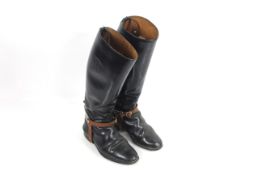 A pair of black Officers boots complete with spurs